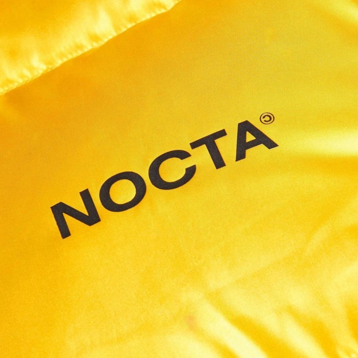 Nike x Drake NOCTA Puffer Jacket | Yellow