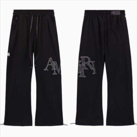 AMIRI Staggered Logo Track Pants | Black