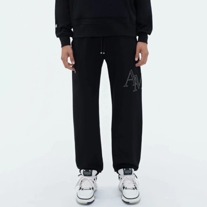 AMIRI Staggered Logo Track Pants | Black