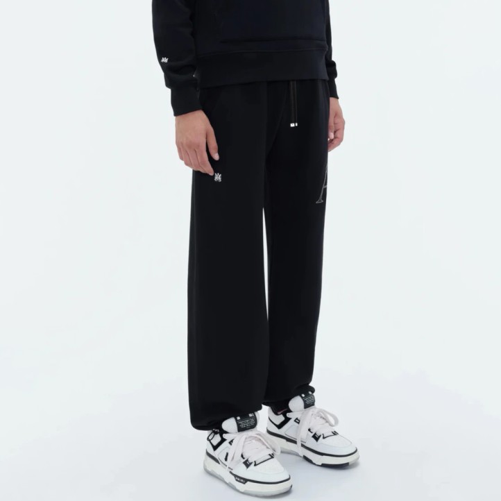 AMIRI Staggered Logo Track Pants | Black