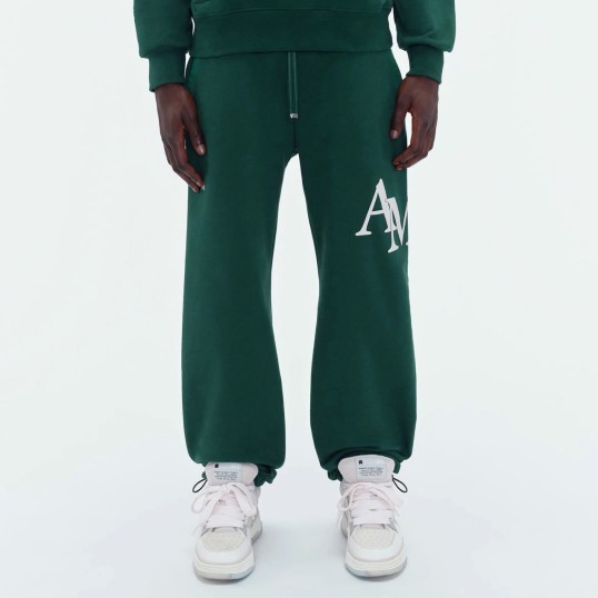 AMIRI Staggered Logo Sweatpants | Green